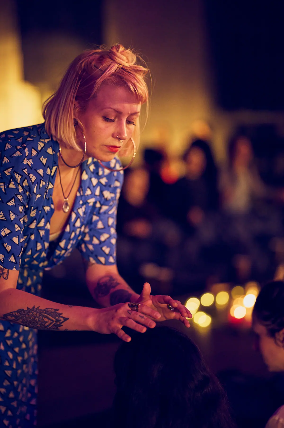 Hands holding sacred herbs for a shamanic healing ritual.